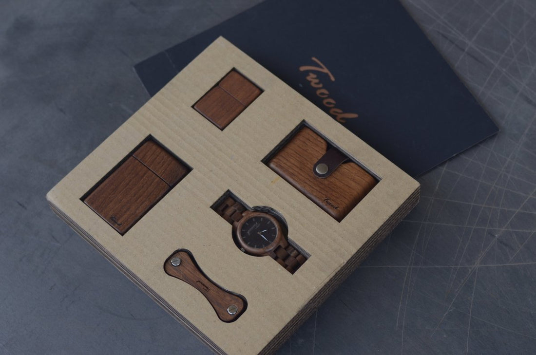 Collection of handcrafted wooden gifts including wooden watches, wallets, desk organizers and accessories displayed on natural wood background
