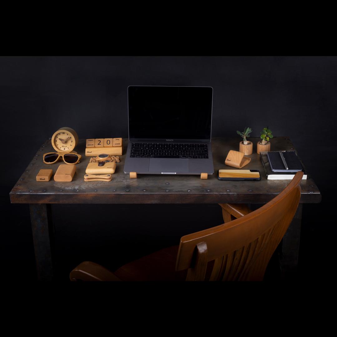 Sustainable office comparison - natural wooden desk accessories vs plastic alternatives