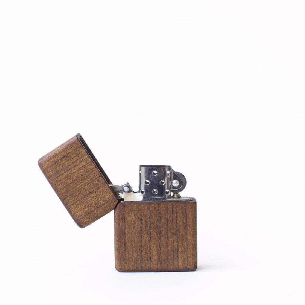 eco-friendly wooden lighter with a natural wood finish and metal components, compact size, sustainable design