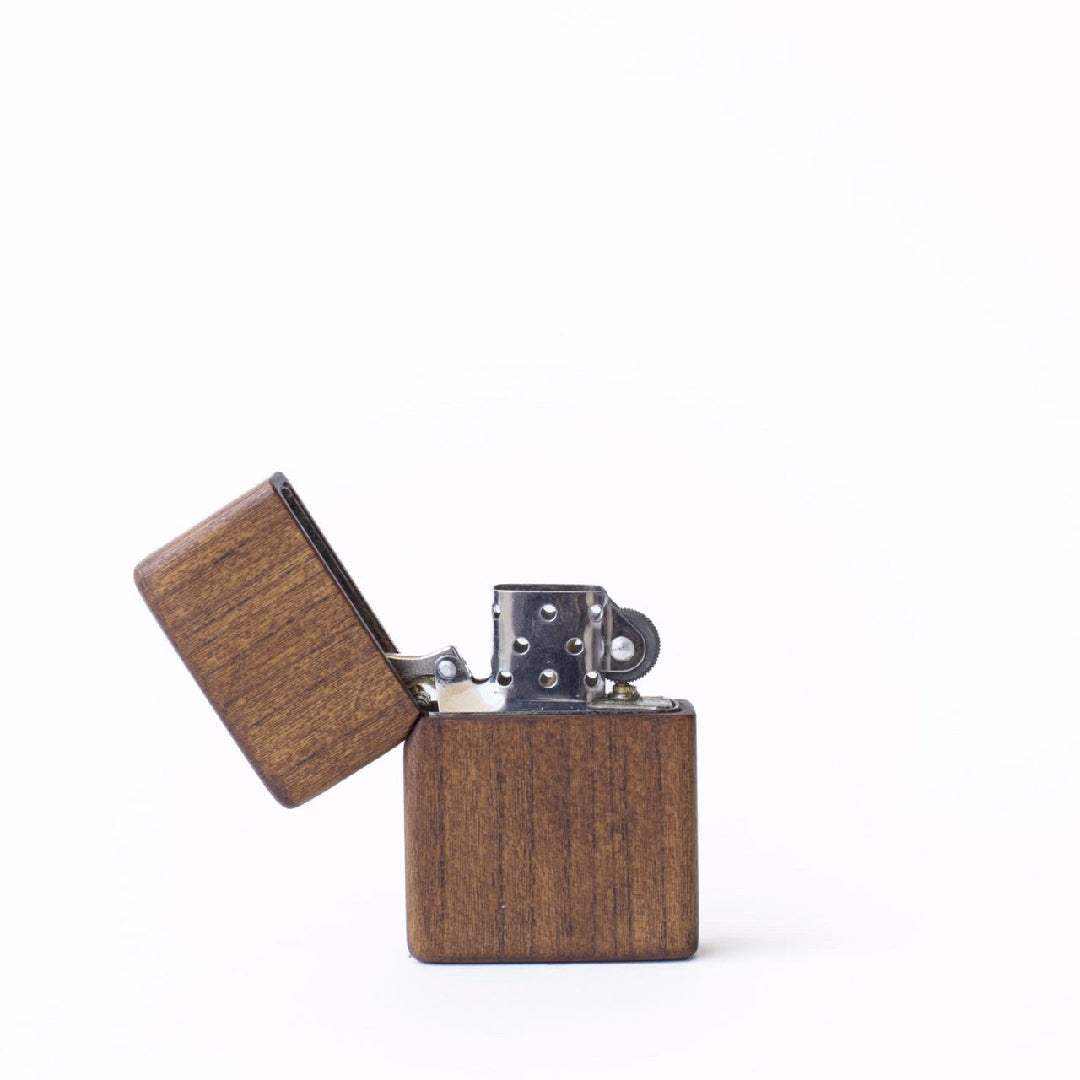 eco-friendly wooden lighter with a natural wood finish and metal components, compact size, sustainable design