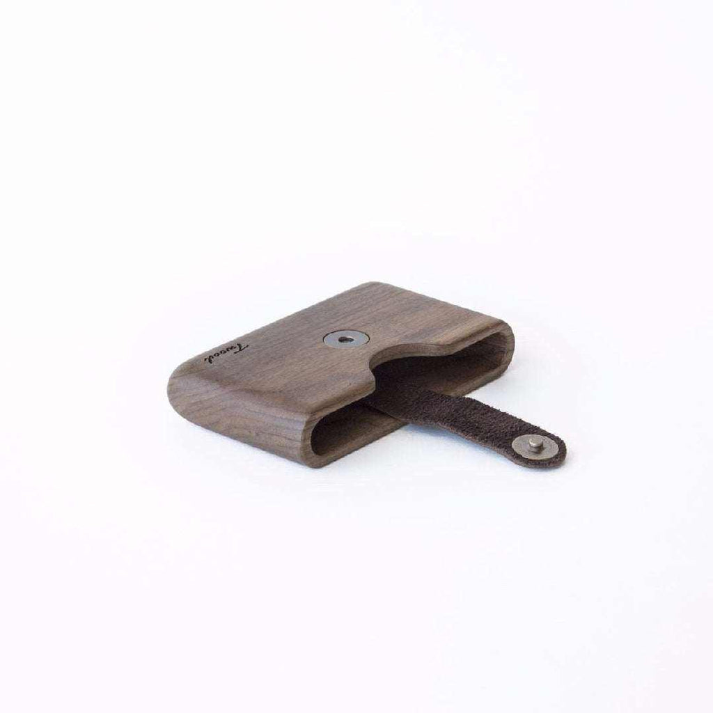 Sustainable handmade wooden wallet with card slot and leather strap closure