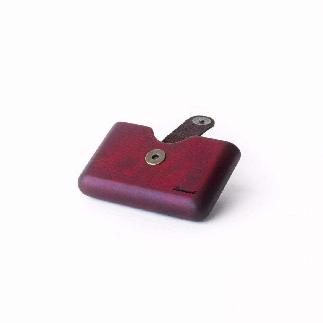 Compact eco-friendly wooden wallet with card slot and secure snap closure in dark red finish