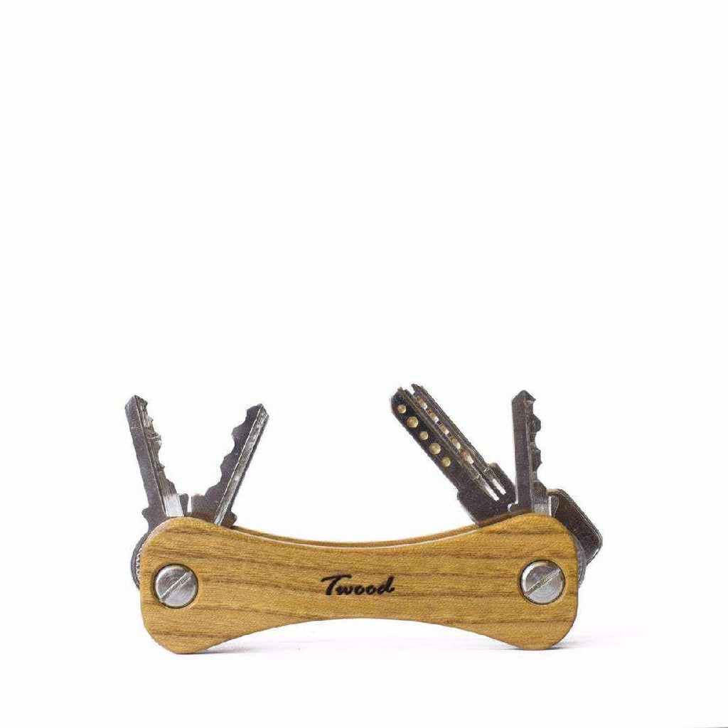 Retractable wooden keychain holding six keys with sustainable handcrafted design