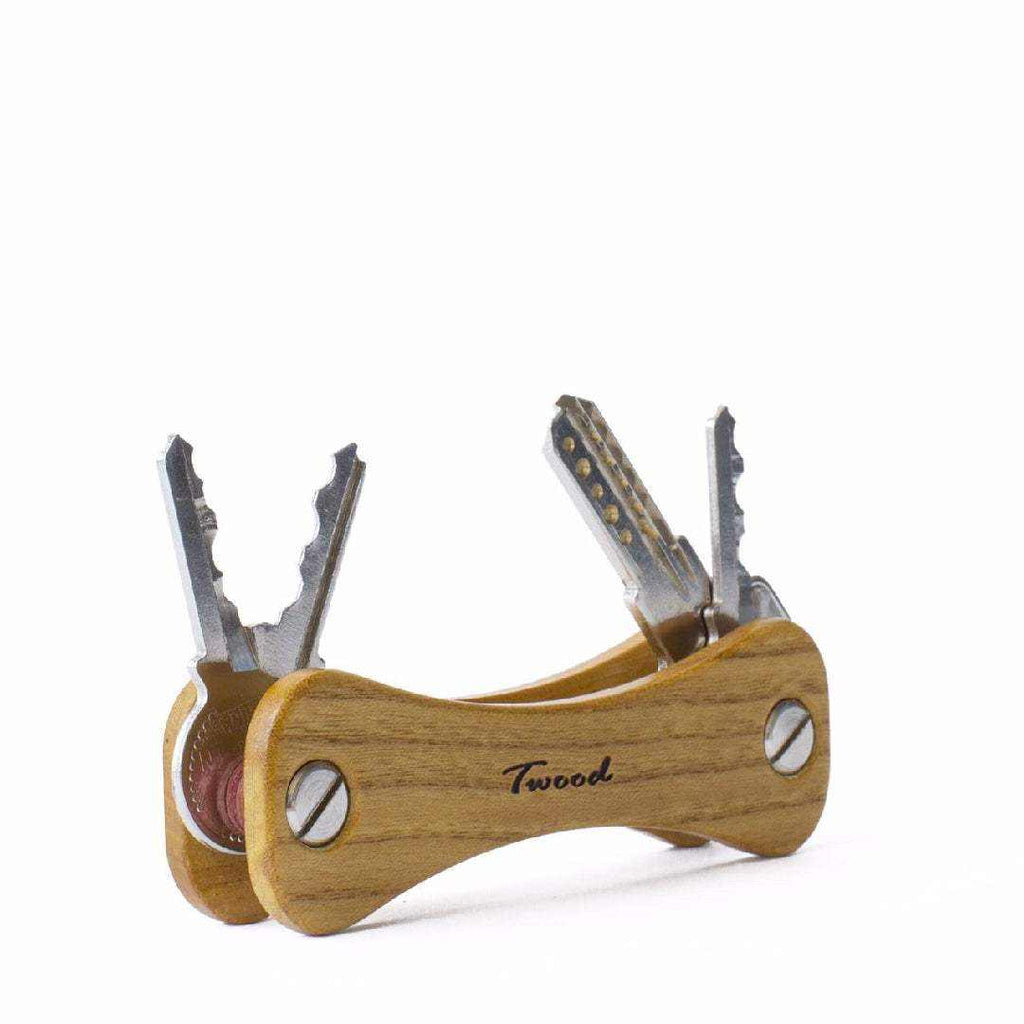 Compact handcrafted wooden keychain with six keys and retractable design by Twood
