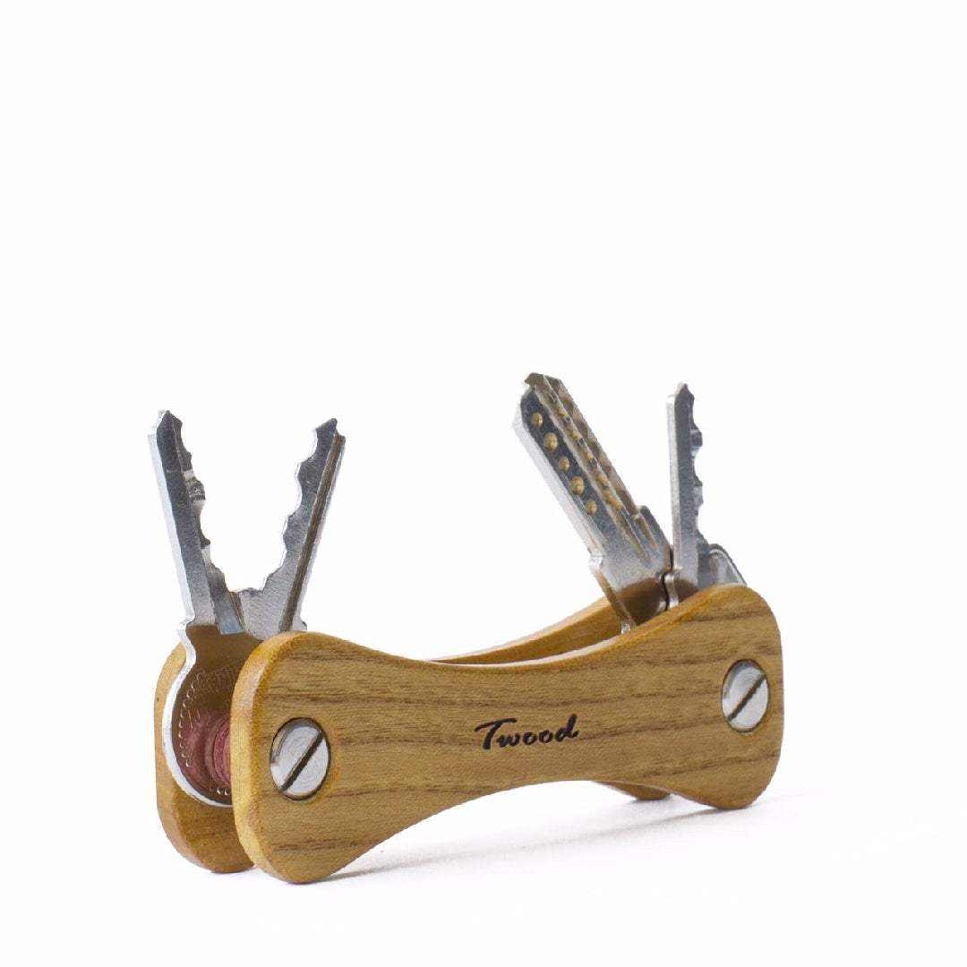 Compact handcrafted wooden keychain with six keys and retractable design by Twood