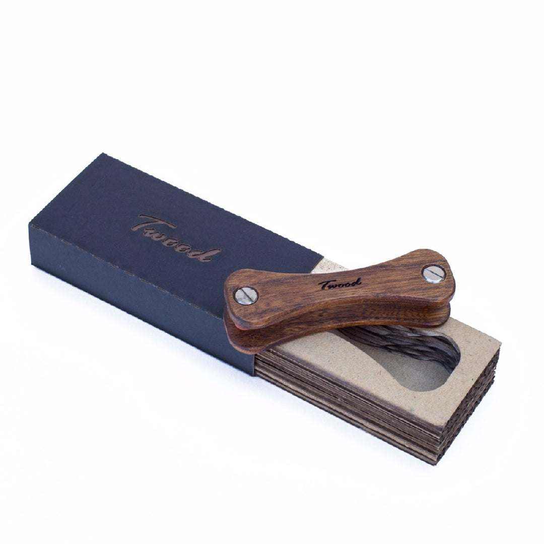 Handcrafted wooden keychain with six keys and retractable design in eco-friendly packaging