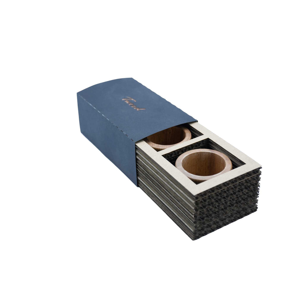 Eco-friendly wooden tealight holder set in natural wood finish, perfect for candles or flowers.