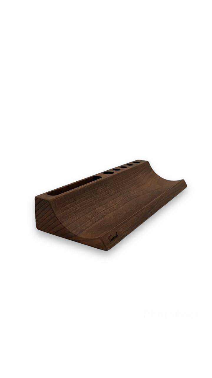 Handcrafted wood pen holder with unique natural grain and multiple slots for desk organization