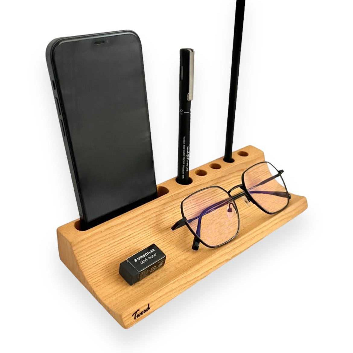 Handcrafted wood pen holder organizer with slots for phone, glasses, and writing instruments on natural wooden base